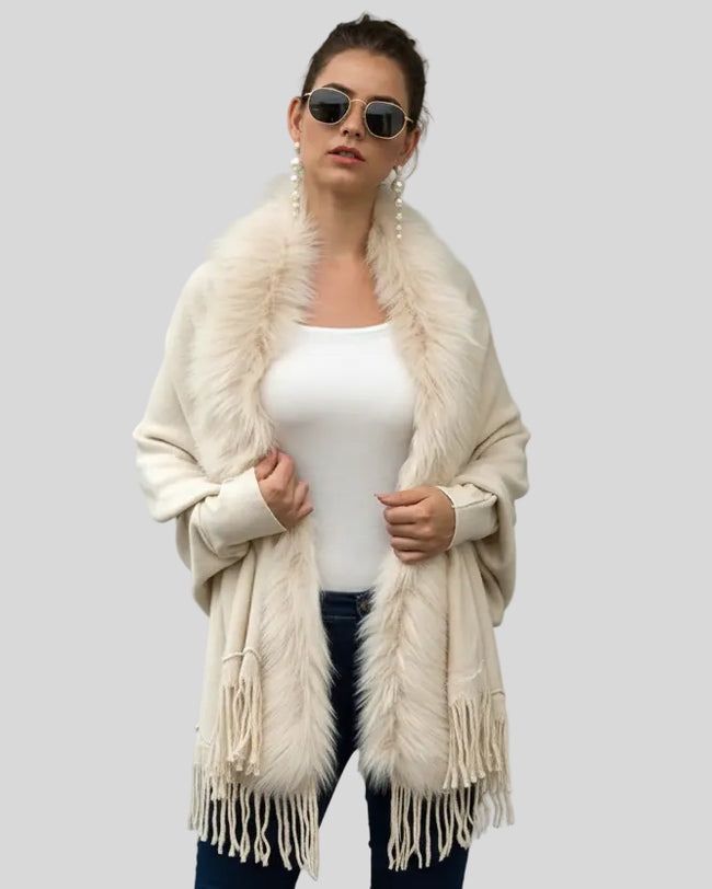 SoftMotion open-front poncho in ivory with relaxed drape and fringe detail, front view