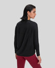 Back view of Athlesi SoftFlow relaxed long sleeve top in black