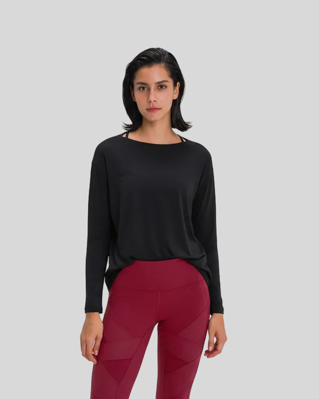 Athlesi SoftFlow relaxed long sleeve active top in black, front view