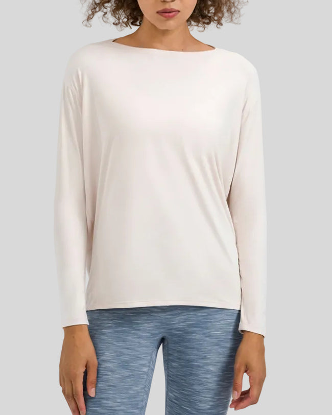 Athlesi SoftFlow relaxed long sleeve active top in cream, front view