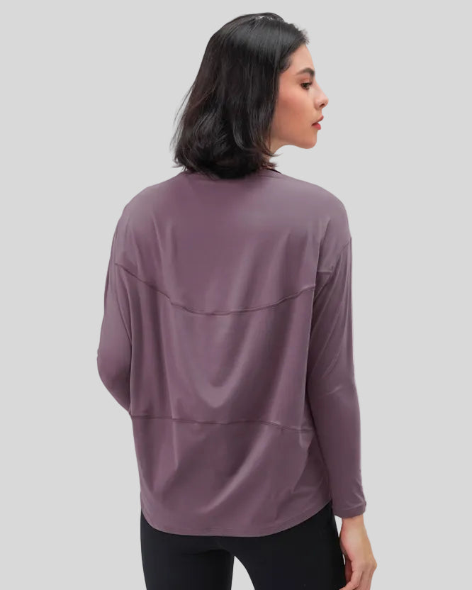 Back view of Athlesi SoftFlow relaxed long sleeve top in mauve