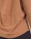Close-up of Athlesi SoftFlow soft stretch fabric in sherbet