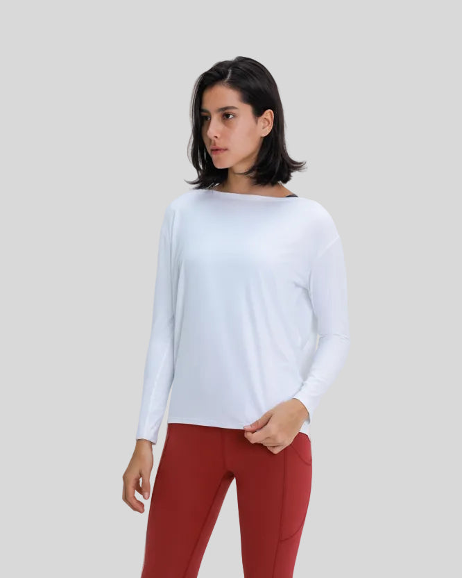 Athlesi SoftFlow relaxed fit long sleeve top in white, angled front view
