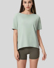 SoftFlow Short Sleeve Active Top in light green, front angled view