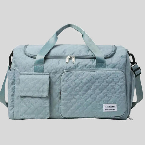 SoftForm Carry Bag in air force blue with quilted texture and structured design