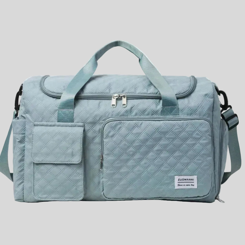 SoftForm Carry Bag in air force blue with quilted texture and structured design