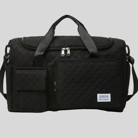 SoftForm Carry Bag in black with quilted texture and structured design