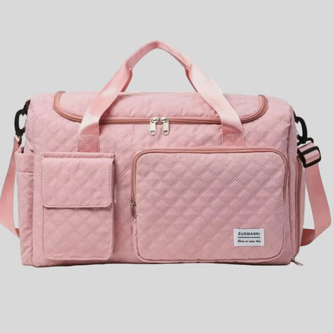 SoftForm Carry Bag in dusty pink with quilted texture and structured design