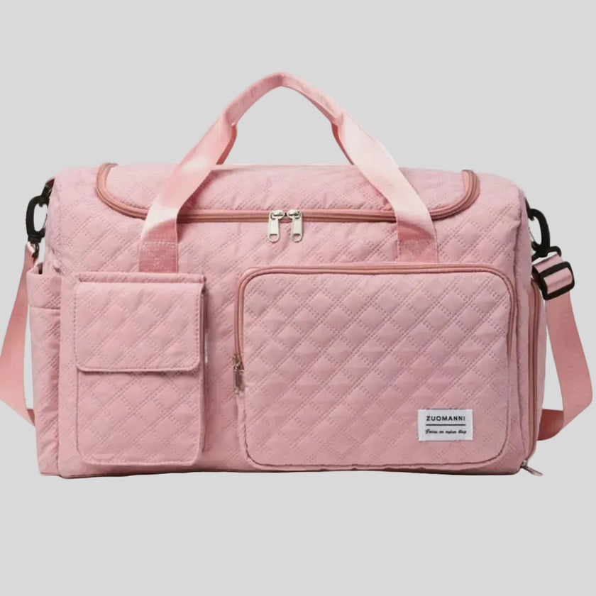 SoftForm Carry Bag in dusty pink with quilted texture and structured design
