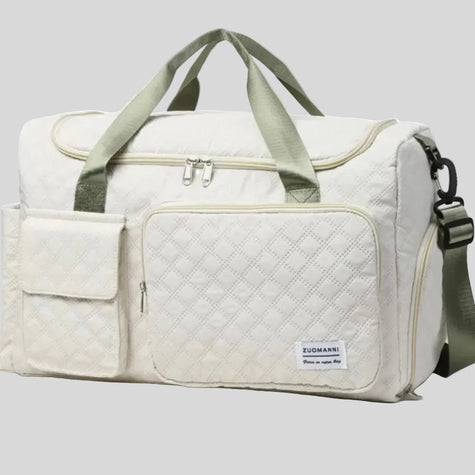 SoftForm Carry Bag angled view highlighting quilted pattern and front pockets