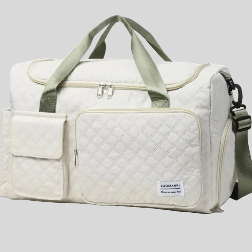 SoftForm Carry Bag angled view highlighting quilted pattern and front pockets