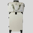 SoftForm Carry Bag attached to suitcase using back luggage strap