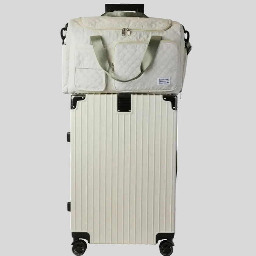 SoftForm Carry Bag attached to suitcase using back luggage strap