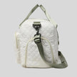 Side view of SoftForm Carry Bag showing soft structured silhouette
