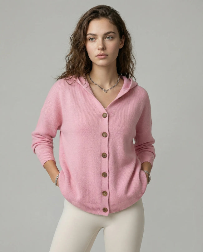 Model wearing a pink SoftForm Hooded Cardigan with buttons on a neutral setting