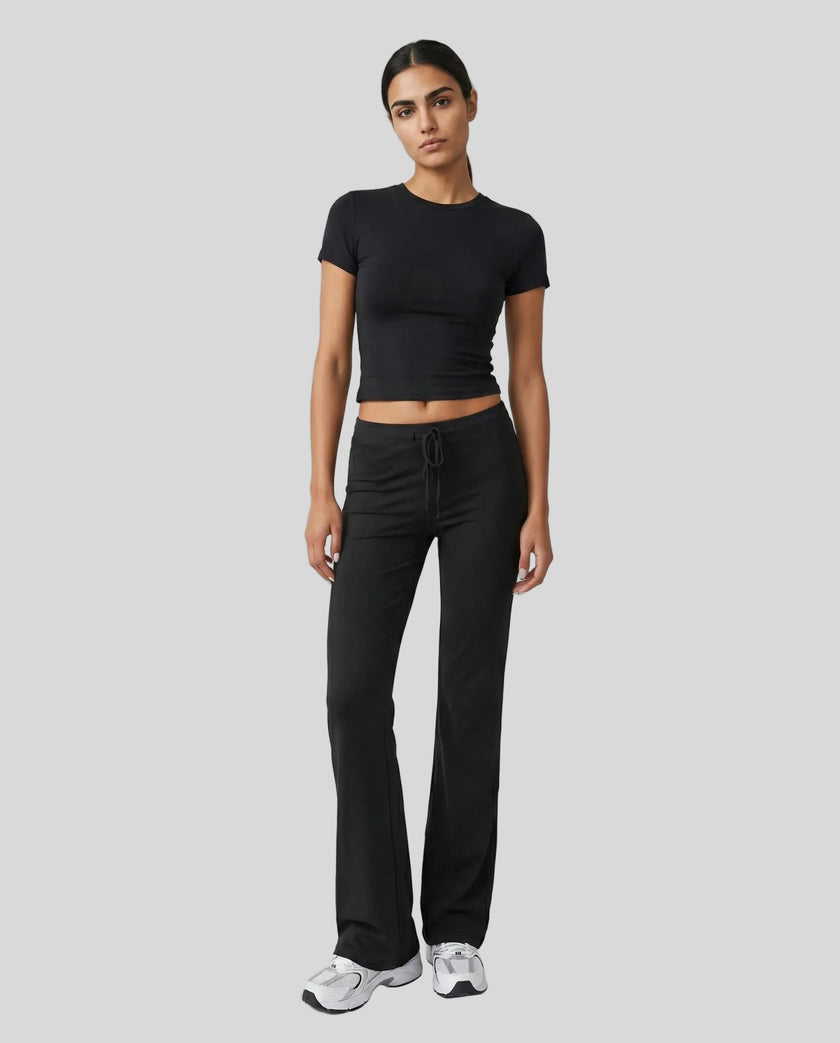 Model front view wearing black Athlesi SoftForm short sleeve lounge set