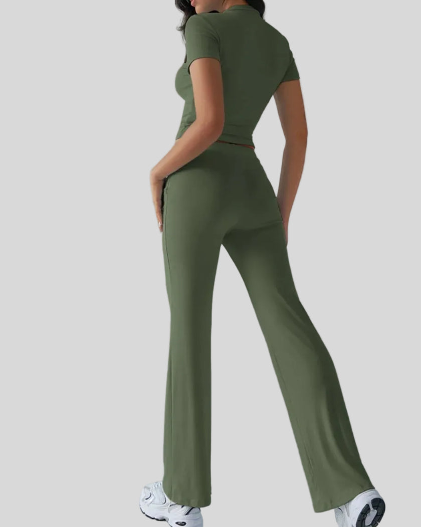 Back view of model wearing moss Athlesi SoftForm short sleeve top and pant set