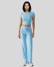 Model front view wearing pastel blue Athlesi SoftForm short sleeve lounge set