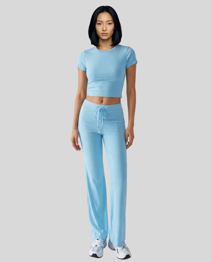 Model front view wearing pastel blue Athlesi SoftForm short sleeve lounge set