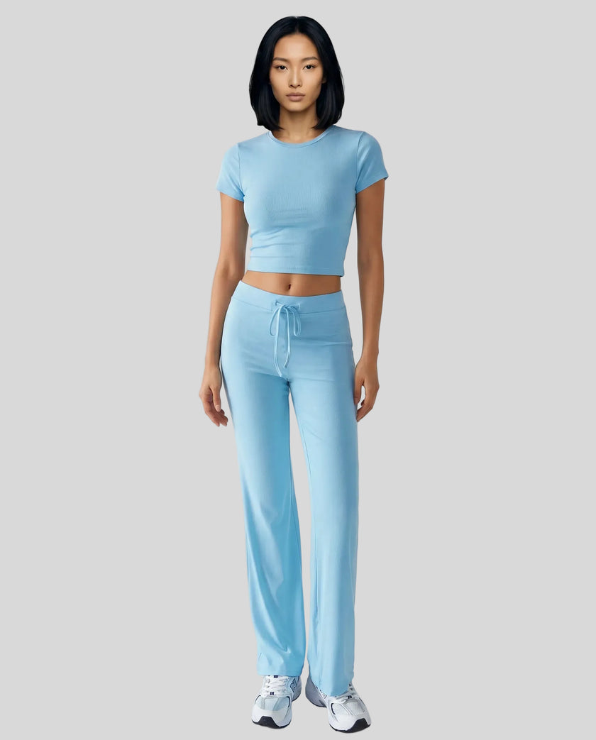 Model front view wearing pastel blue Athlesi SoftForm short sleeve lounge set