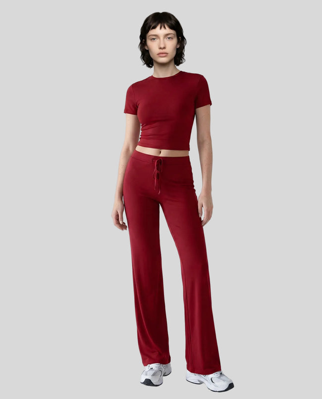 Model front view wearing rust Athlesi SoftForm short sleeve lounge set