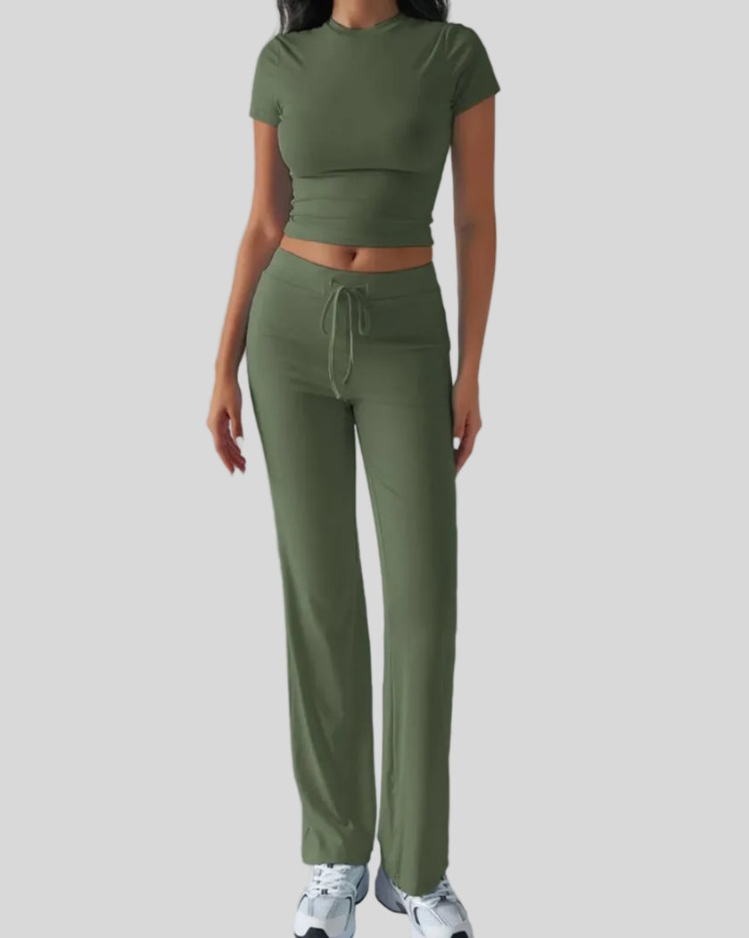 Model wearing moss Athlesi SoftForm short sleeve top and pant set front view