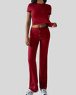 Model wearing rust Athlesi SoftForm short sleeve top and pant set front view
