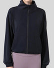 SoftForm Zip Active Jacket in black, fully zipped front view