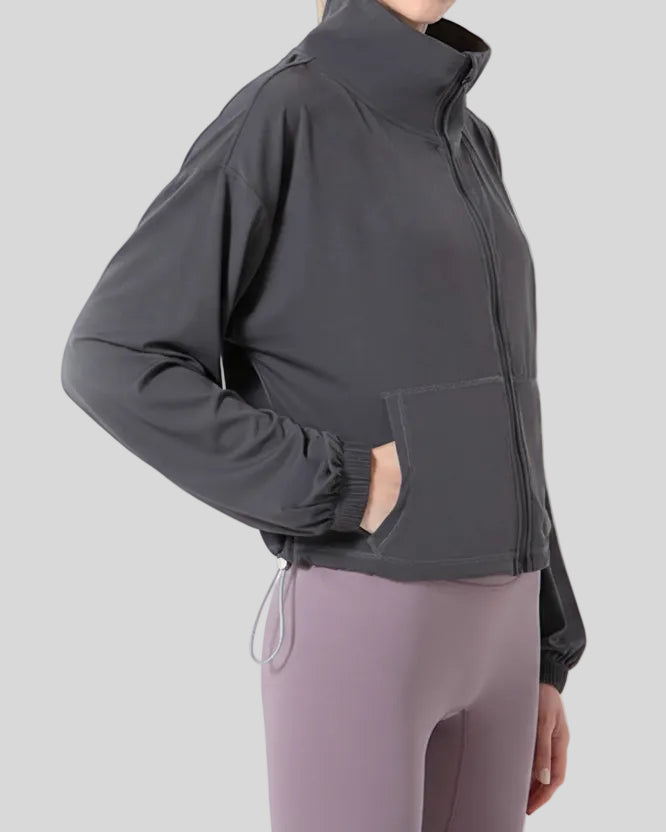 Left side view of SoftForm Zip Active Jacket in dark gray