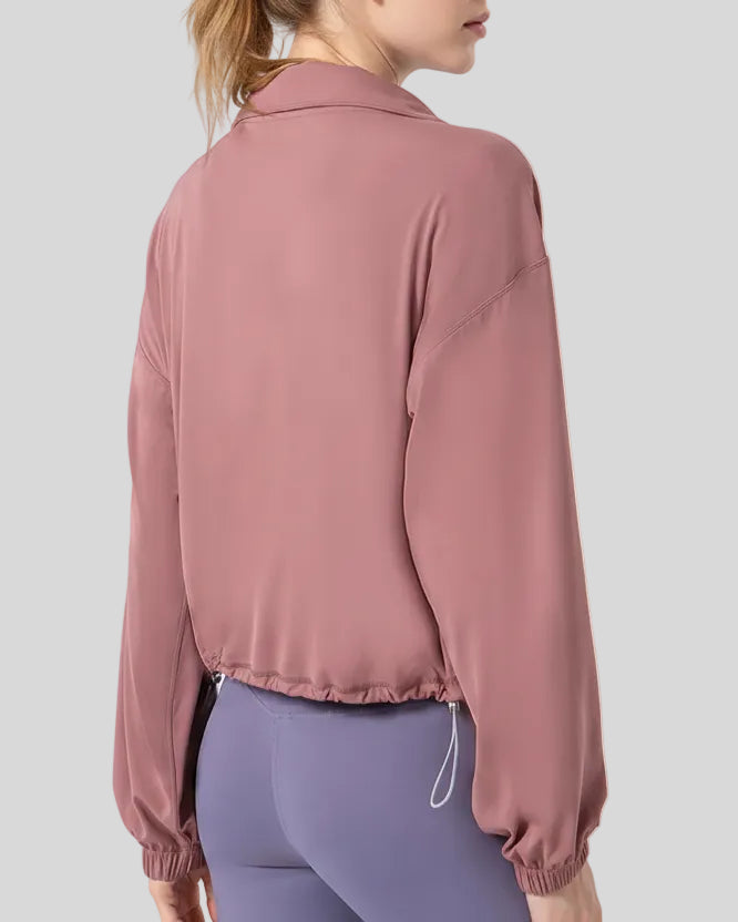 Back view of SoftForm Zip Active Jacket in dusty pink