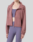 SoftForm Zip Active Jacket worn open, dusty pink front view