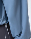 Sleeve detail of SoftForm Zip Active Jacket in light blue