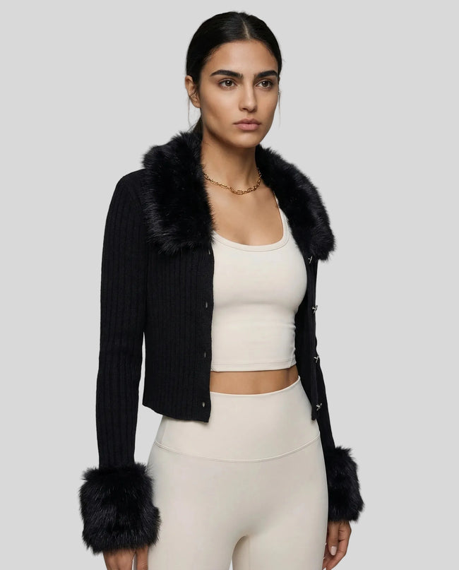 SoftLuxe Ribbed Cardigan in black worn by model mid body front view highlighting texture and trim