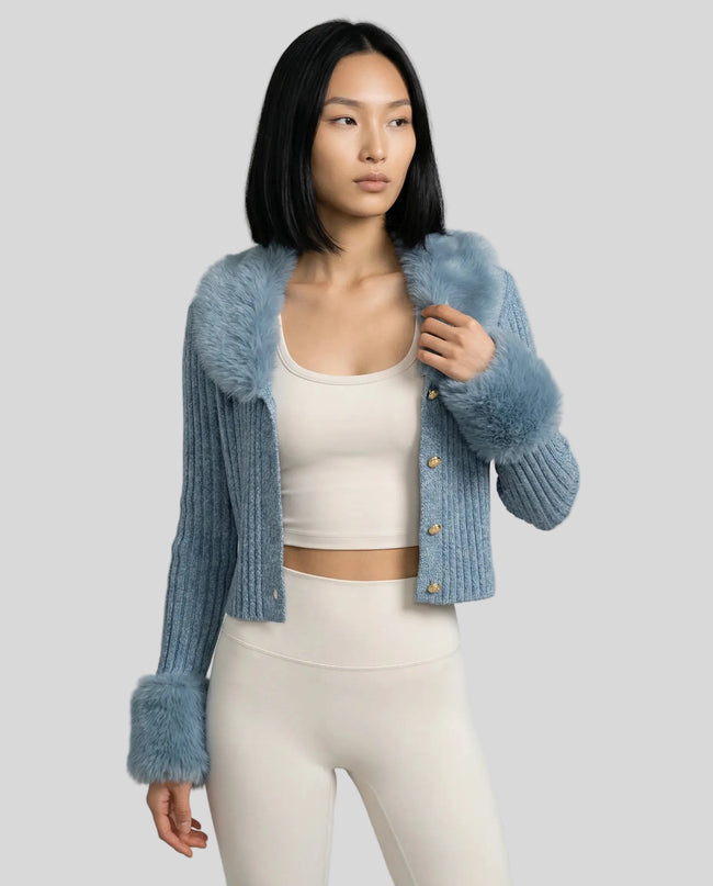 SoftLuxe Ribbed Cardigan in light blue worn by model mid body front view highlighting texture and trim