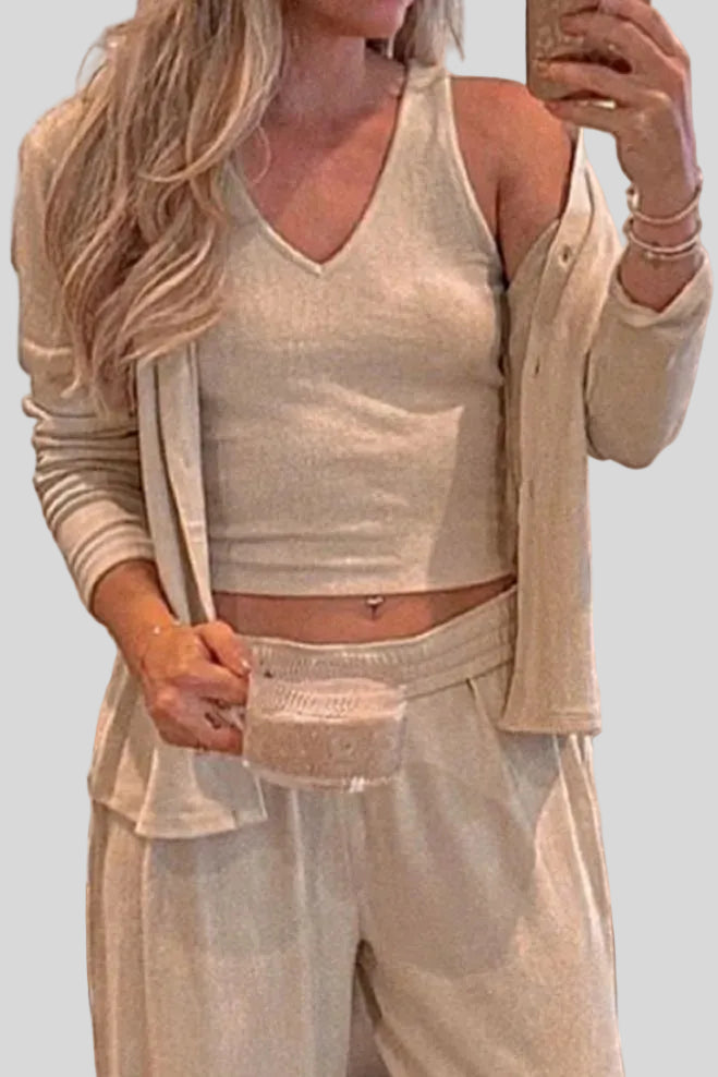 Mid-body closeup of the SoftNest Lounge Set in beige showing soft fabric texture and layered lounge styling