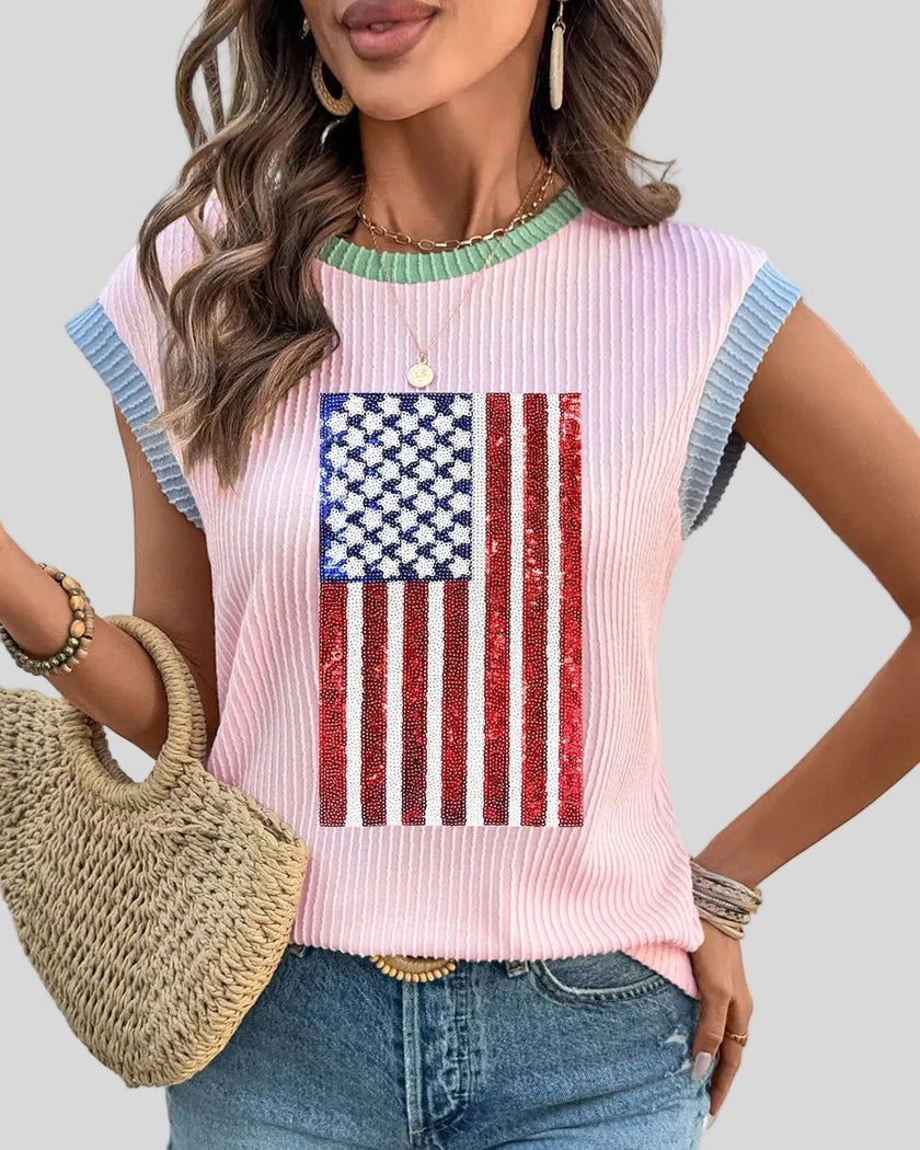 Ribbed sleeveless tee with sequin accent tucked into pants, front view