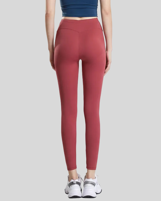 Back view of dusty pink Statement Angel Legging with cropped sporty fit