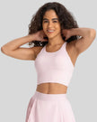 StrataLuxe ladder back sports bra in blush pink front view longline design