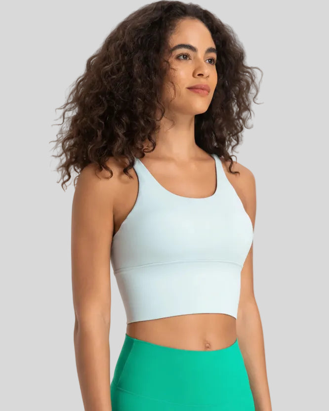 Angled front view of mint blue ladder back longline sports bra Athlesi