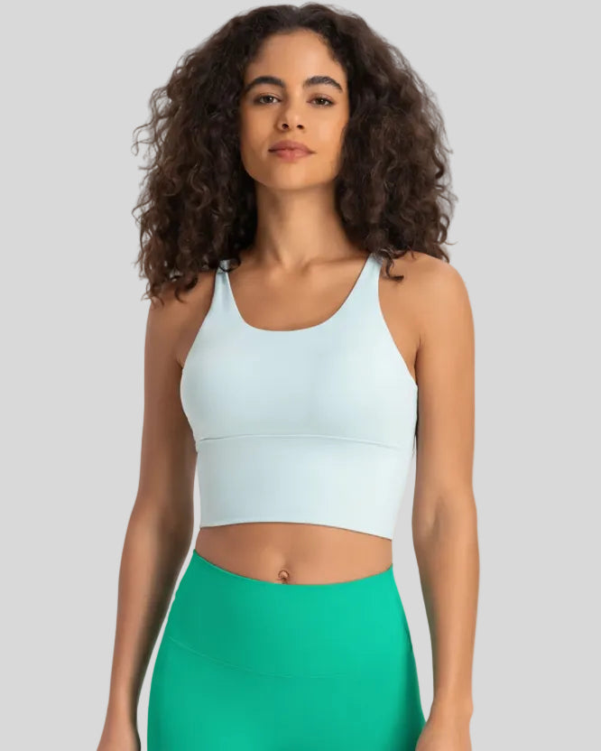 StrataLuxe ladder back sports bra in mint blue front view longline design