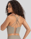 Back view of StrataLuxe mocha sports bra with crisscross ladder straps