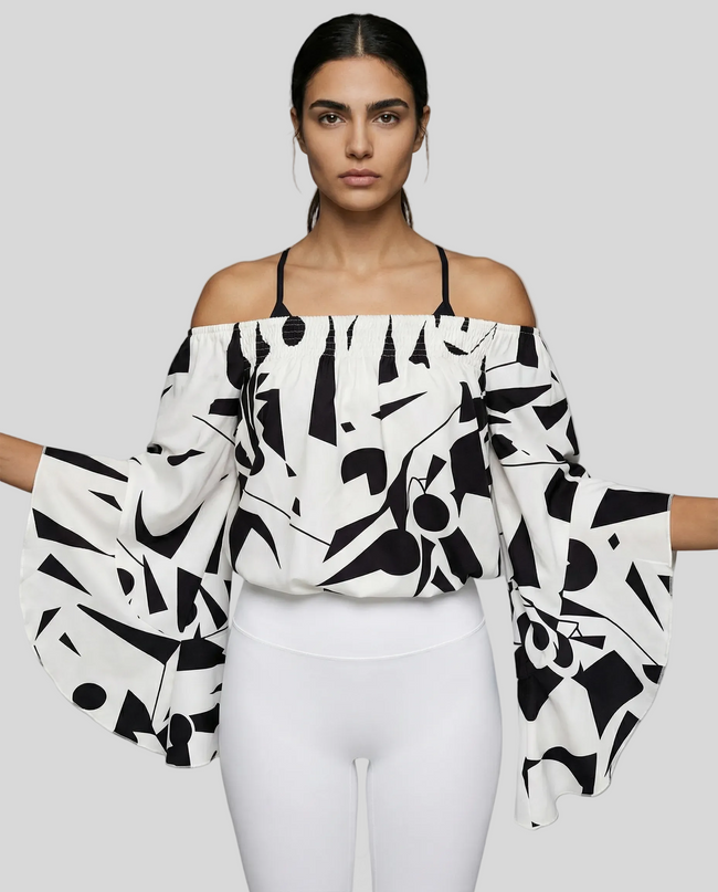StreetBloom off-shoulder blouse in white styled with white Athlesi leggings front view