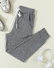 Front flat lay of Athlesi StreetFlow Drawstring Jogger Pant in dark gray