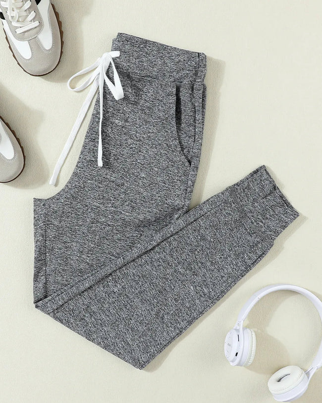 Front flat lay of Athlesi StreetFlow Drawstring Jogger Pant in dark gray