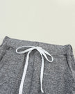 Close-up of drawstring waistband on dark gray Athlesi StreetFlow Jogger Pant