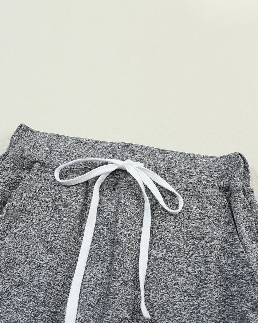 Close-up of drawstring waistband on dark gray Athlesi StreetFlow Jogger Pant