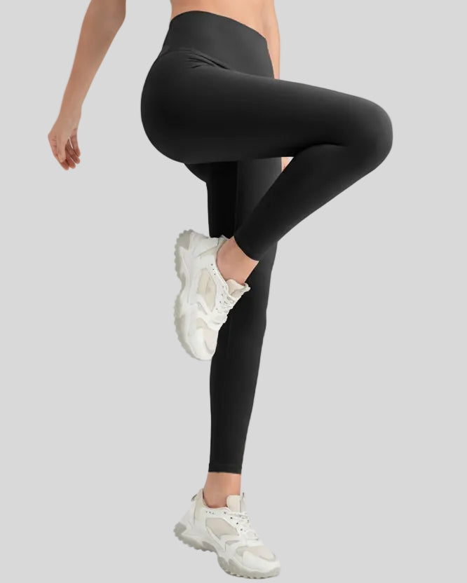 Side view of Athlesi StrideSculpt Slim Legging in black