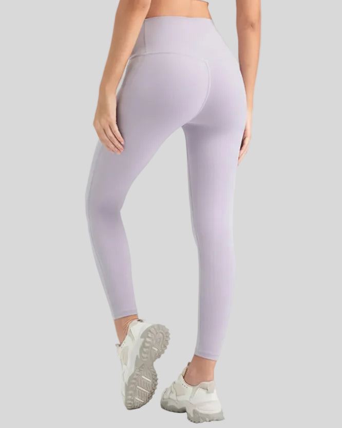 Back view of Athlesi StrideSculpt Slim Legging in blush pink
