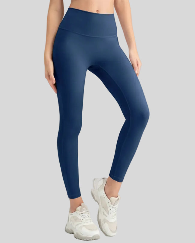 Athlesi StrideSculpt Slim Legging in dark blue, front view