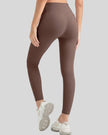 Angled back view of Athlesi StrideSculpt Slim legging in mocha